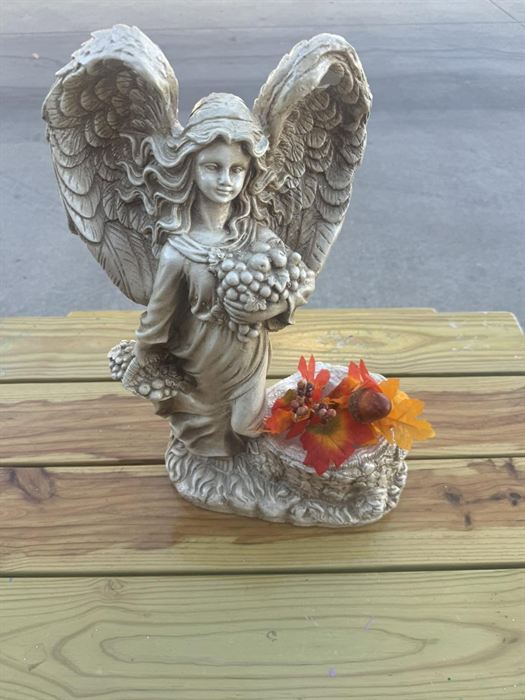 Standing plaster winged angel