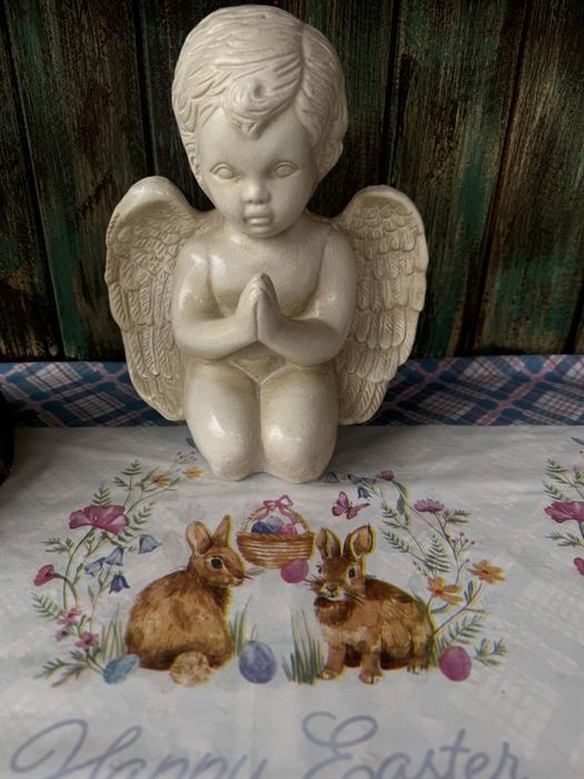 Kneeling plaster praying angel