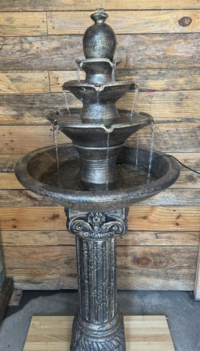 Three-tier cast plaster fountain on a fluted column