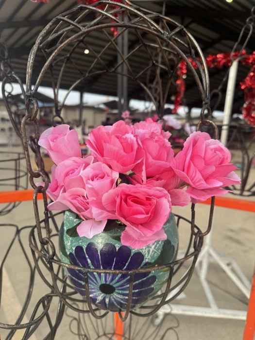 Scrolled wrought iron hanging basket