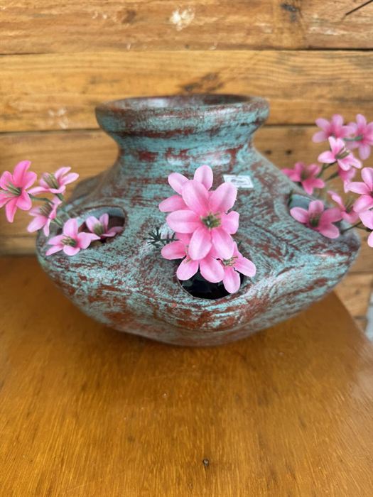 Glazed strawberry pot with a verdigris finish